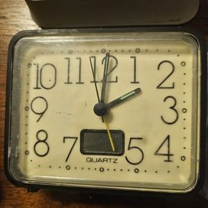 Vintage glow in the dark alarm clock and temperature guage
